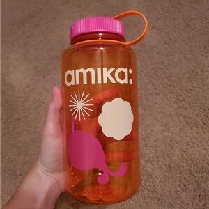 Amika Vibrant Orange Bottle with Pink Cap